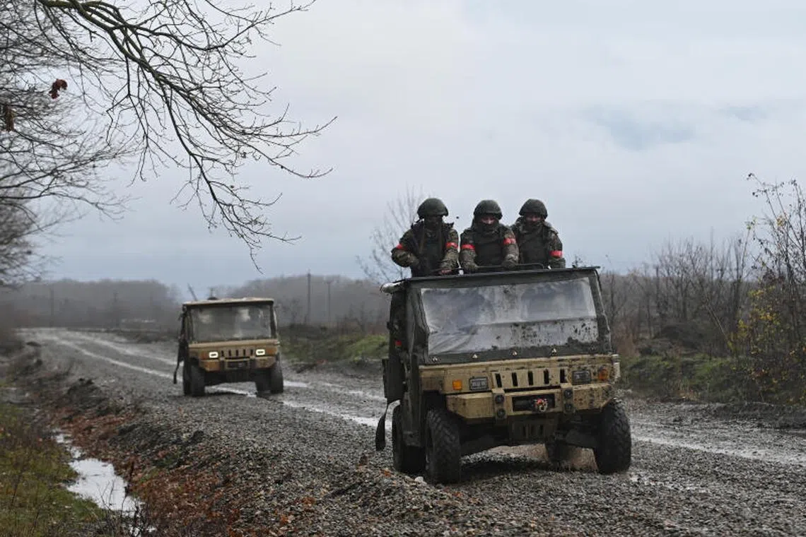 Russian service members ride military buggies during combat training at a firing range, in the course of Russia-Ukraine conflict, in Krasnodar region, Russia December 12, 2024. REUTERS/Sergey Pivovarov