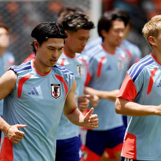 Japan’s Takumi Minamino and Ritsu Doan during training on June 28 in Houston, Texas.