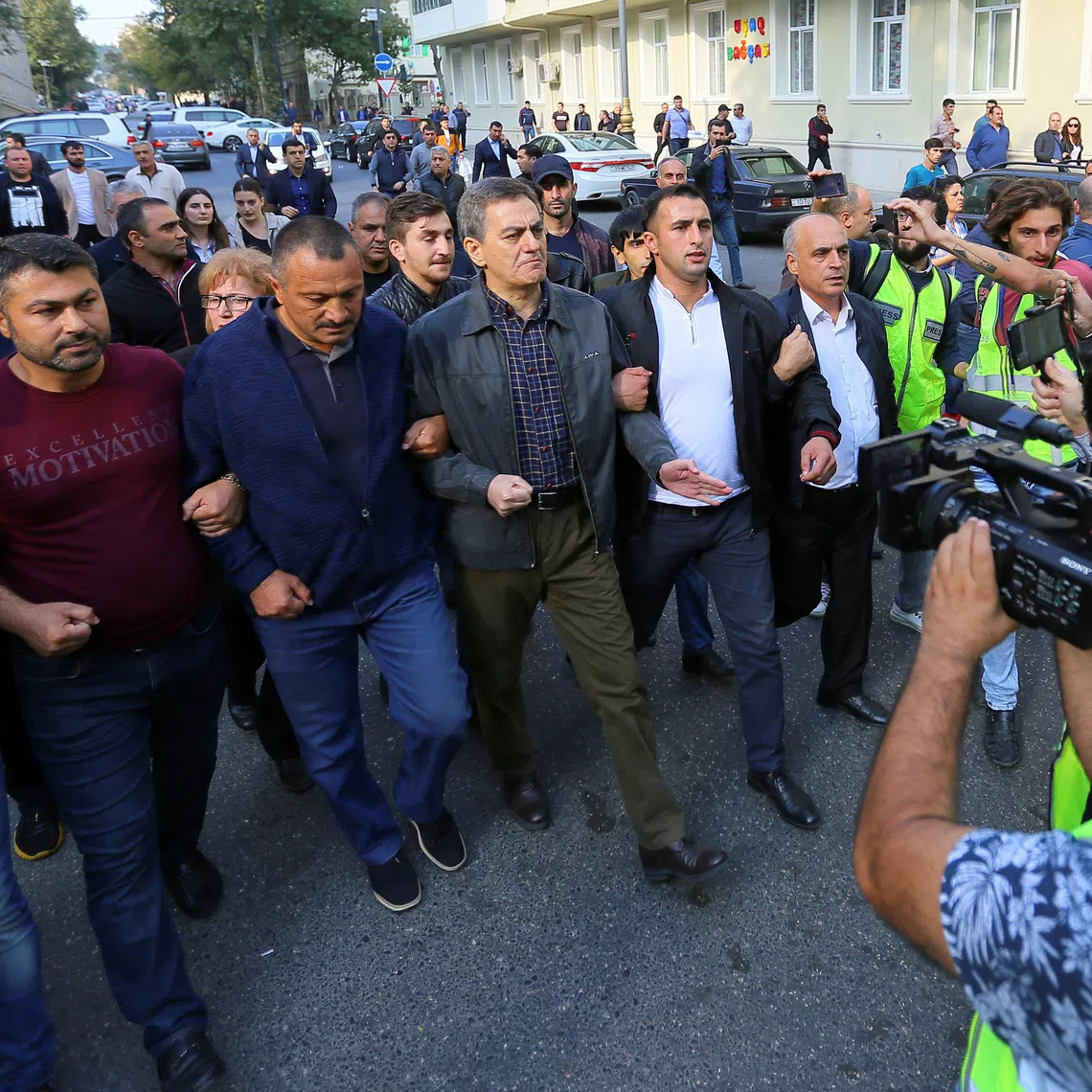 FILE PHOTO: Head of the Popular Front Party of Azerbaijan Ali Karimli and his supporters hold an unauthorized rally to demand the freedom of assembly in Baku, Azerbaijan October 19, 2019. REUTERS/Aziz Karimov/File Photo