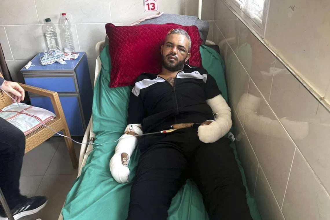 In an undated photo he provided, Amin Abed, a Palestinian activist who has been critical of Hamas, is seen in hospital after being assaulted by Hamas security operatives in July. 