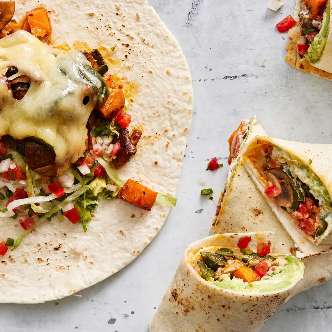 Roasted vegetable burritos are a great way to clear leftovers in the fridge.