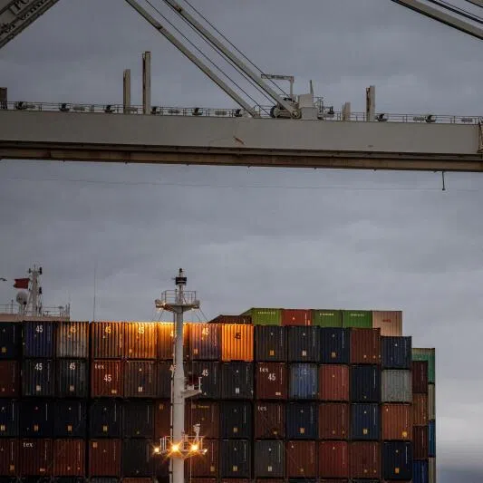  Shipping containers are stacked up at the port of Oakland, in the US state of California. 