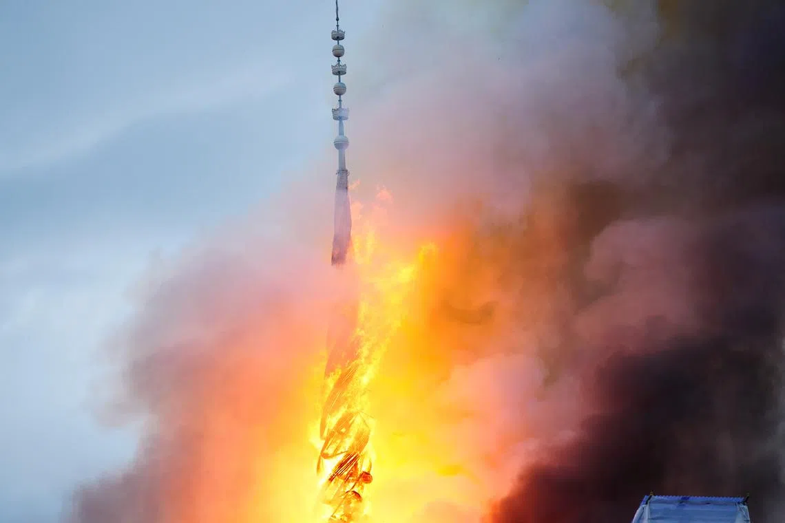 A view of the Old Stock Exchange's \"twisted dragons on spire\" during a fire at the Boersen, in Copenhagen, Denmark April 16, 2024.  Ritzau Scanpix/Ida Marie Odgaard/via REUTERS