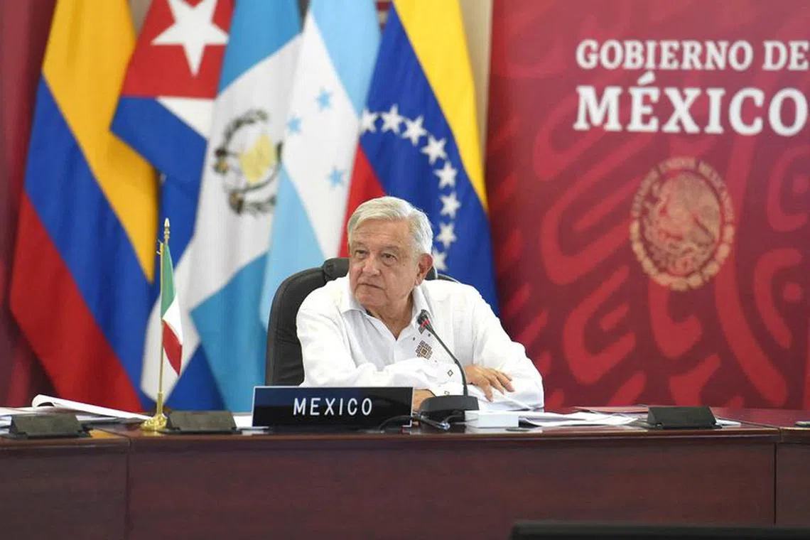 FILE PHOTO: Mexico's President Andres Manuel Lopez Obrador listens during a summit of leaders from Latin America and the Caribbean in the southern city of Palenque looking to broker accords to curb a recent jump in migrants bound for the U.S. border, in Palenque, Mexico in this handout picture distributed to Reuters on October 22, 2023. Mexico Presidency/Handout via REUTERS/File Photo