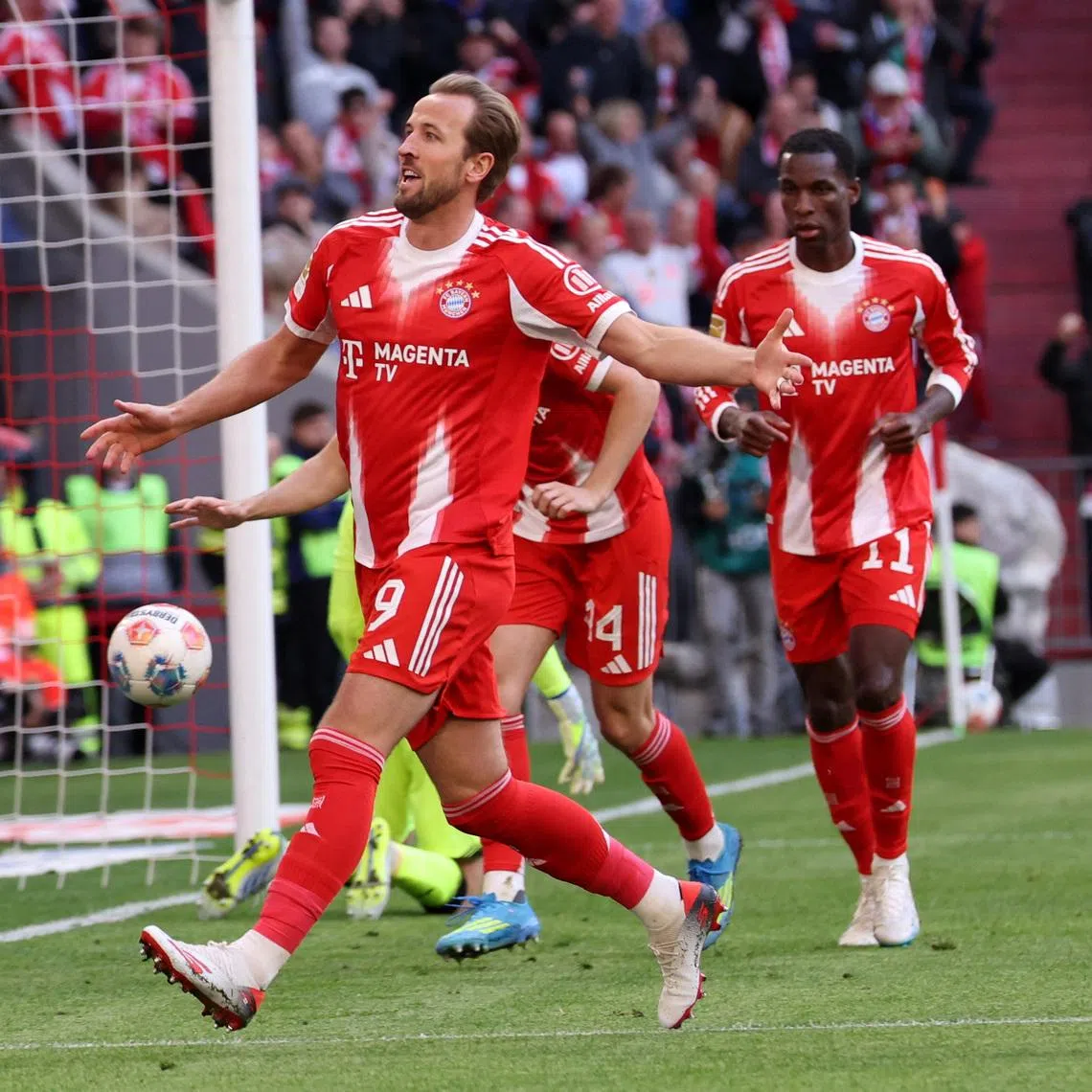 Bayern Munich's Harry Kane celebrates scoring their fourth goal. The Bavarians were a goal down before scoring four times to quickly turn the game around.
