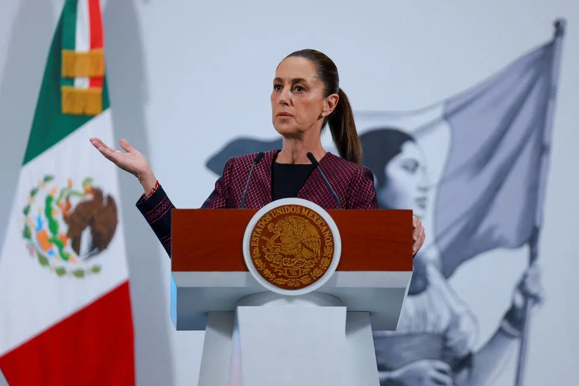 FILE PHOTO: Mexico's President Claudia Sheinbaum addresses the media at the National Palace, in Mexico City, Mexico June 11, 2025. REUTERS/Raquel Cunha/File Photo