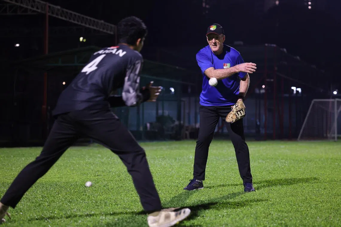 Former Australian cricketer Geoff Lawson conducting a training session for the Singapore national cricket team at the Singapore Indian Association field in Balestier on Oct 16, 2024. ST PHOTO: JASON QUAH