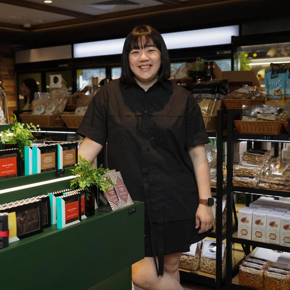 Ms Pang Gek Teng at Surrey Hills Grocer's Ion Orchard outlet in 2024. 