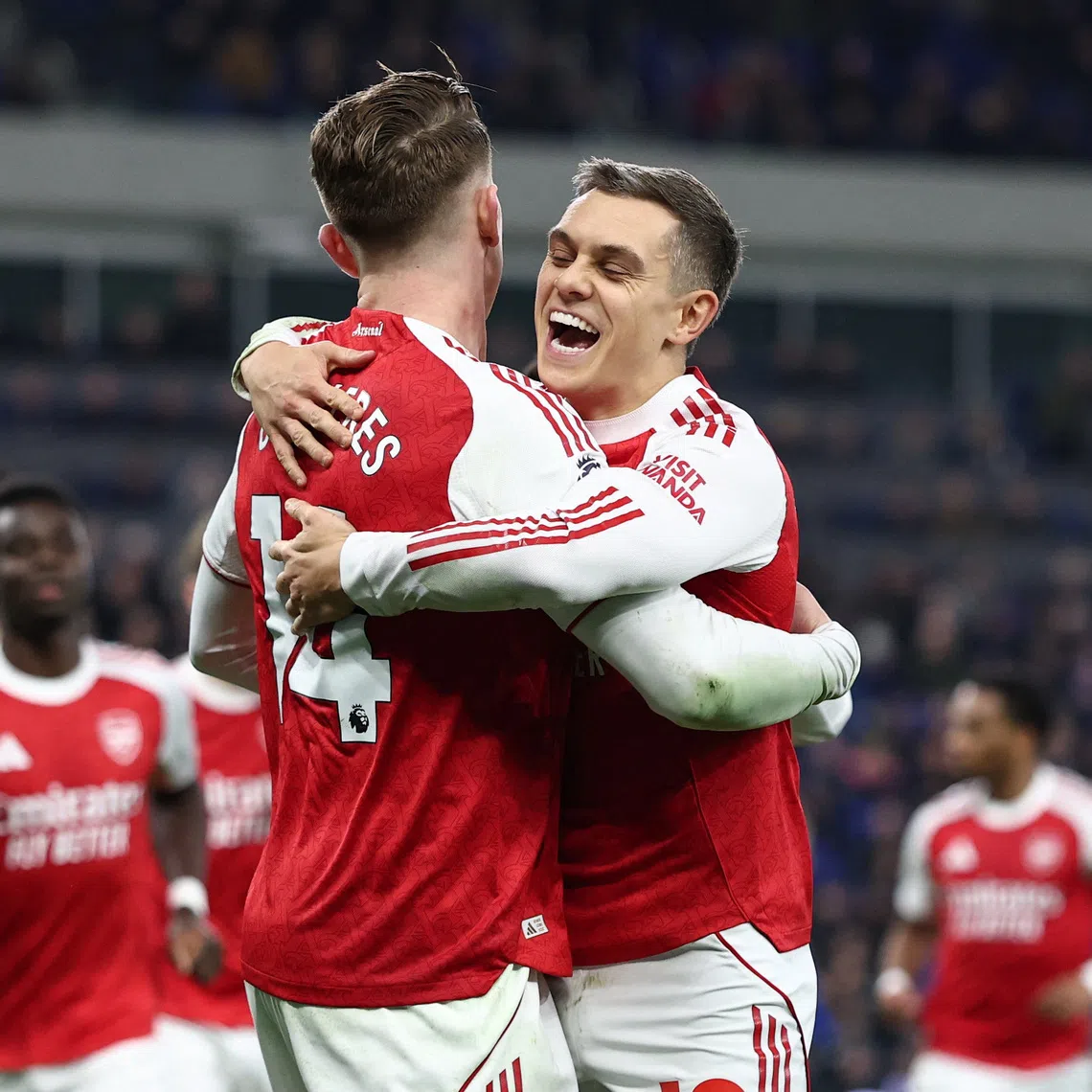 Soccer Football - Premier League - Everton v Arsenal - Hill Dickinson Stadium, Liverpool, Britain - December 20, 2025 Arsenal's Viktor Gyokeres celebrates scoring their first goal with Leandro Trossard REUTERS/David Klein