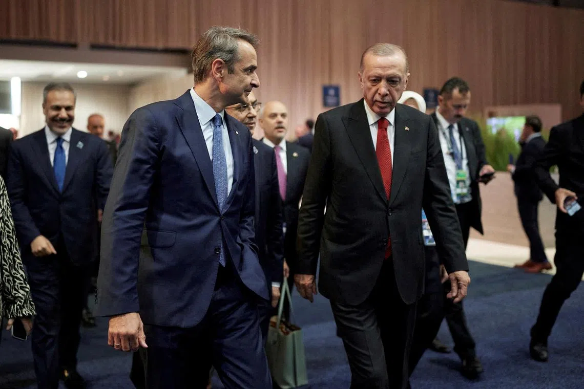 FILE PHOTO: Greek Prime Minister Kyriakos Mitsotakis and Turkish President Tayyip Erdogan meet on the sidelines of NATO Summit, in Washington, United States, July 10, 2024. Dimitris Papamitsos/Greek Prime Minister's Office/Handout via REUTERS/File Photo