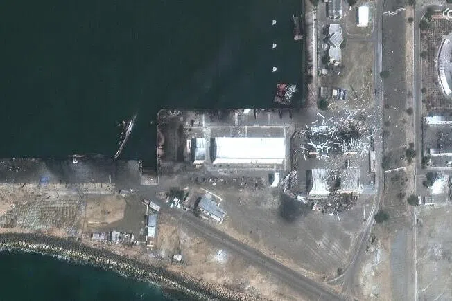 A satellite view shows destroyed naval vessels and buildings after US and Israeli strikes, at Konarak, Iran, March 1, 2026.