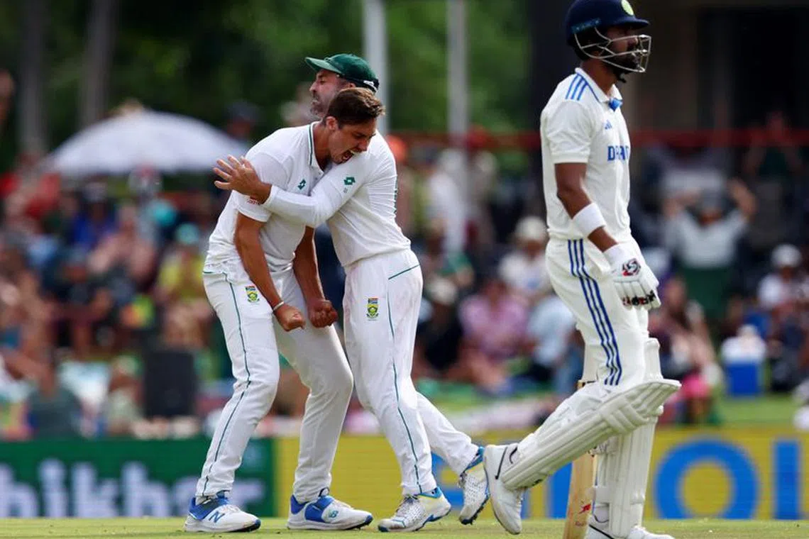 Cricket - First Test - South Africa v India - SuperSport Park Cricket Stadium, Centurion, South Africa - December 28, 2023 South Africa's Nandre Burger celebrates the wicket of India's KL Rahul with teammates REUTERS/Esa Alexander/File Photo