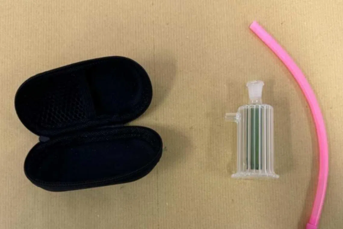 A drug smoking apparatus and pouch recovered from one of the 13-year-old girls arrested on Feb 6.