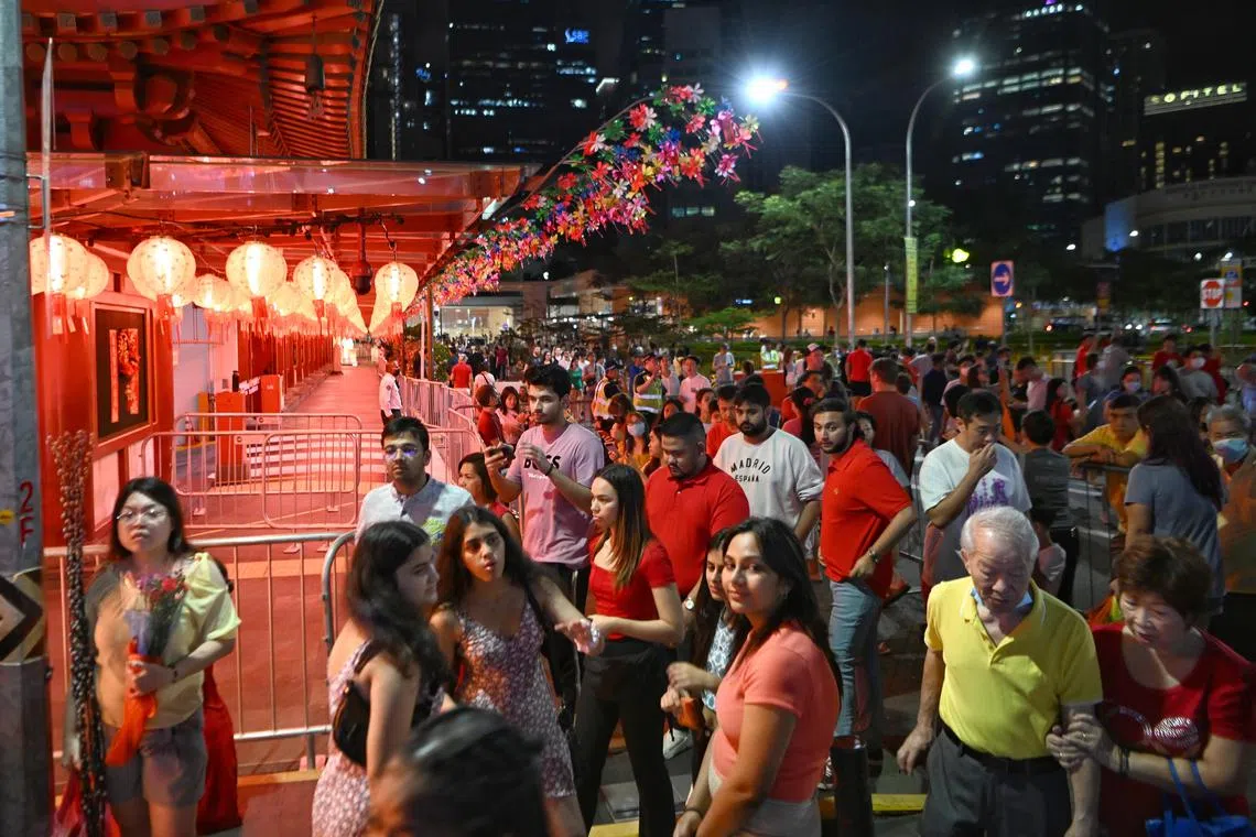 Visitors enjoying the Chinese New Year celebrations in Chinatown on Jan 21, 2023. 