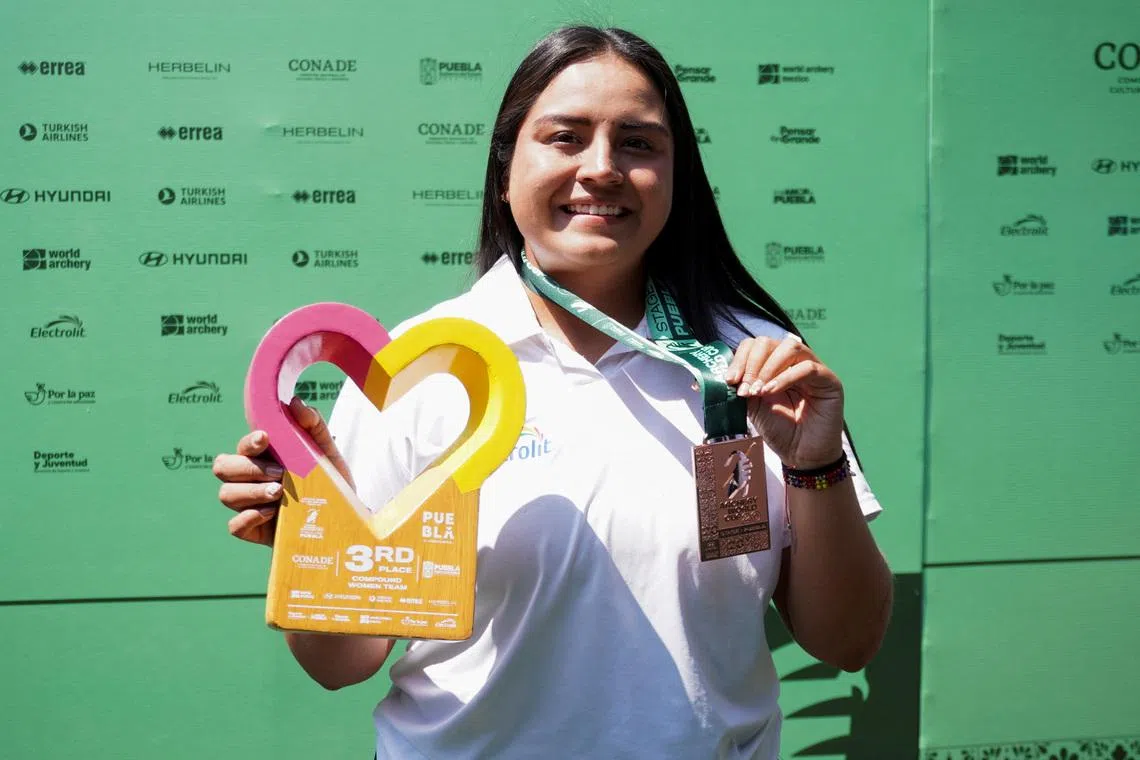Mexican archer Dafne Quintero poses with a bronze medal at the Stage 1 Archery World Cup, in Puebla, Mexico, April 11, 2026. REUTERS/Angelica Medina