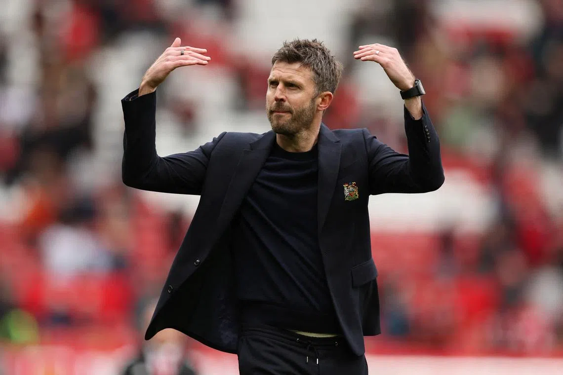 Soccer Football - Premier League - Manchester United v Liverpool - Old Trafford, Manchester, Britain - May 3, 2026 Manchester United manager Michael Carrick celebrates after the match REUTERS/Chris Radburn