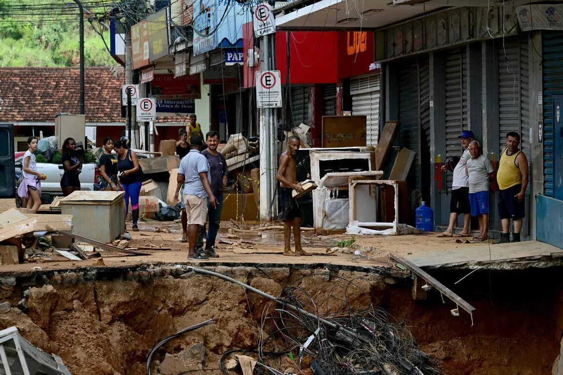 Over 20 people remain missing after flooding and landslides affected the cities of Juiz de Fora and Uba (above), which lie about 110km apart in Brazil's Minas Gerais state.