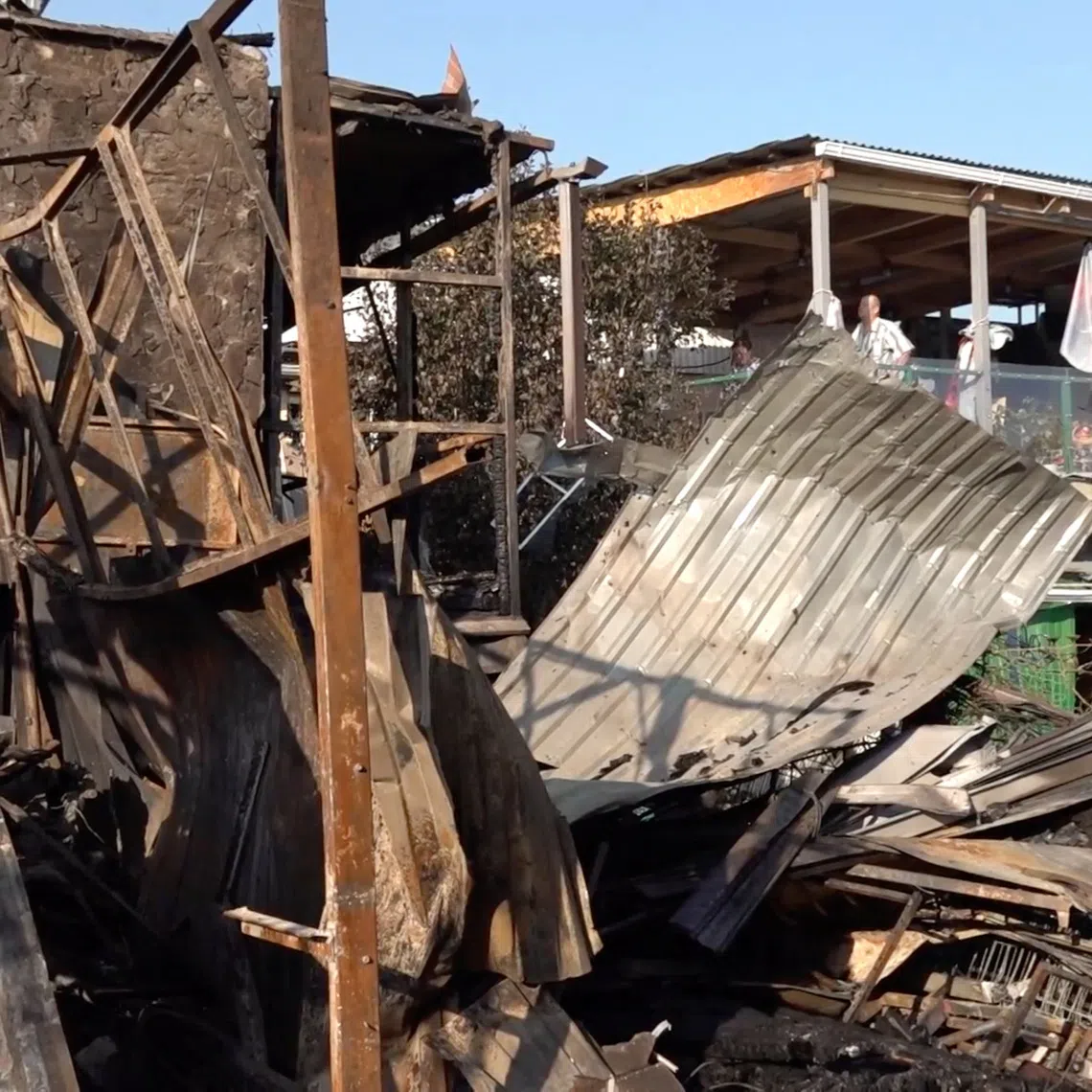 A damaged private house following an overnight attack, what local authorities called a Ukrainian drone strike, in the course of the Russia-Ukraine conflict in Novorossiysk, Russia, in this still image taken from video released on August 12, 2026.  Operations Headquarters of Krasnodar Region/Handout via REUTERS
