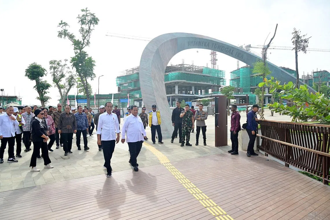 Mr Widodo (centre left) and Mr Prabowo (centre, right) inspecting the progress of construction work in Nusantara. 