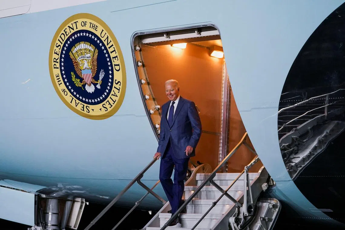 US President Joe Biden disembarks from Air Force One upon his arrival  in County Antrim, Northern Ireland.