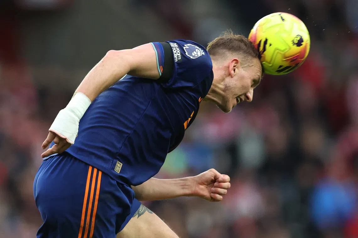 Soccer Football - Premier League - Sunderland v Newcastle United - Stadium of Light, Sunderland, Britain - December 14, 2025 Newcastle United's Dan Burn in action REUTERS/Scott Heppell