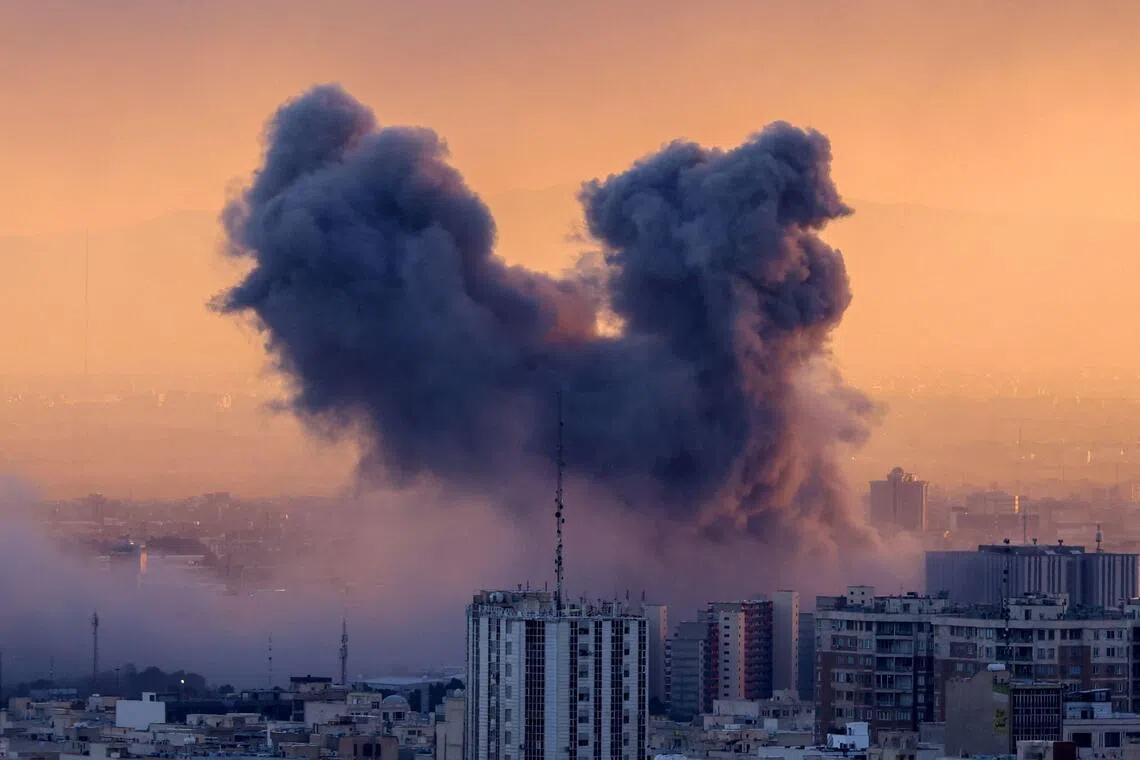 A plume of smoke rising after a strike on the Iranian capital Tehran, on March 3.