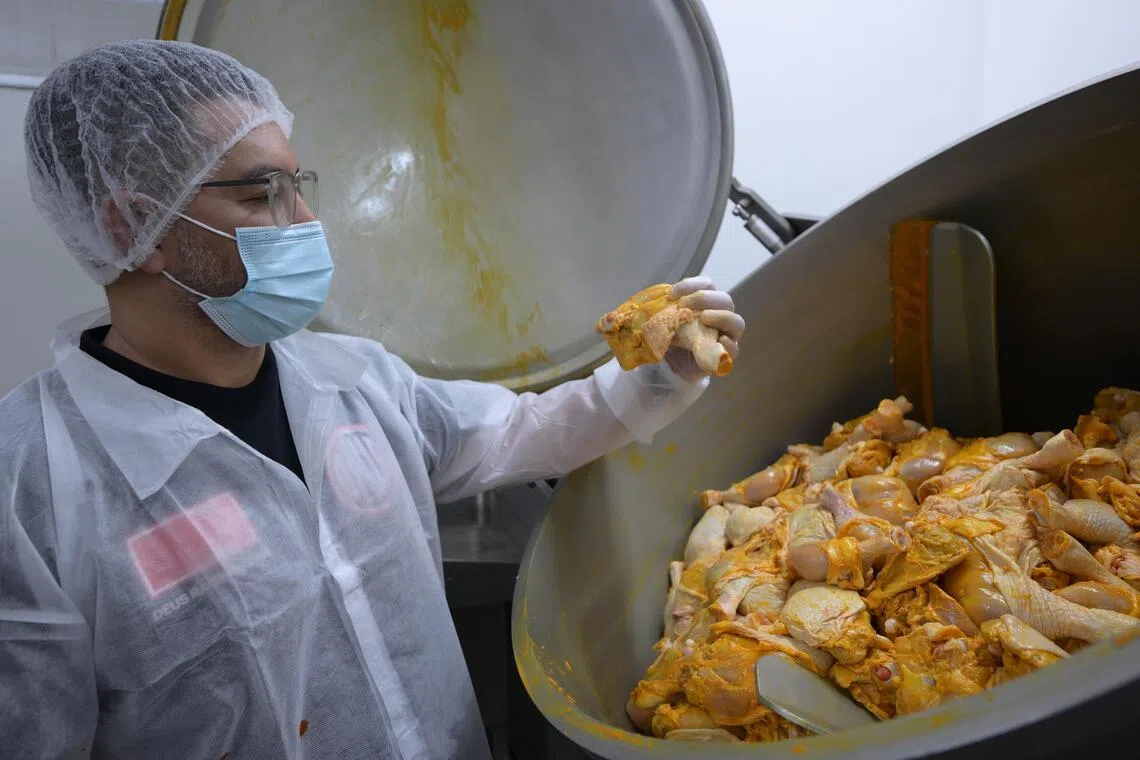  Nasi Lemak Ayam Taliwang's founder, Noorman Mubarak, 47, relies on a central kitchen to supply his 34 outlets. 