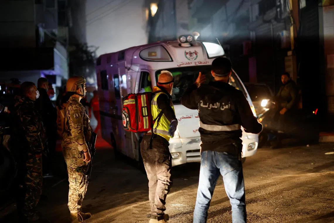 Emergency services work at the site of an Israeli strike in Beirut's Basta neighbourhood, amid the ongoing hostilities between Hezbollah and Israeli forces, Lebanon November 23, 2024. REUTERS/Adnan Abidi