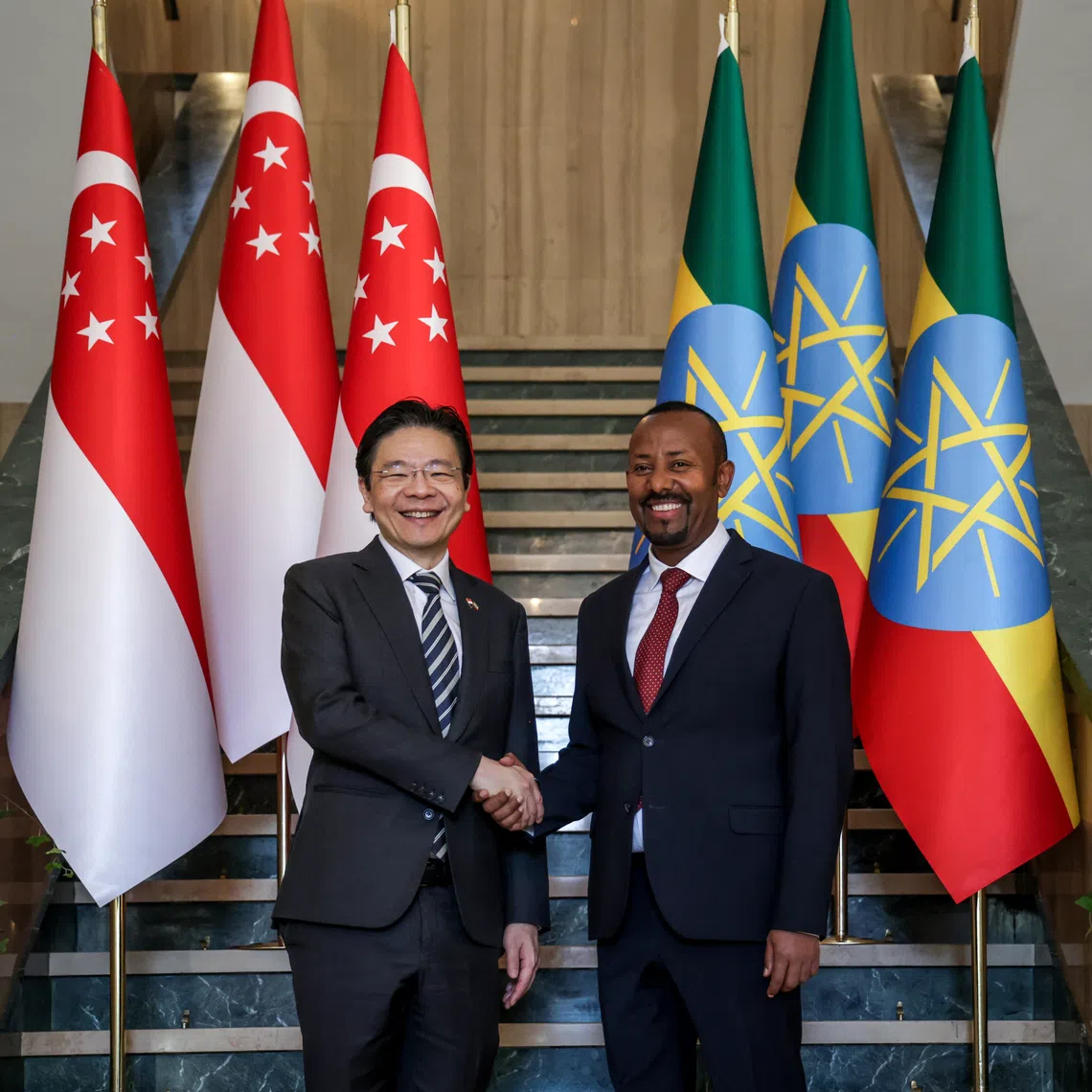 Prime Minister Lawrence Wong (left) with Ethiopian Prime Minister Abiy Ahmed at the National Palace of Ethiopia on Nov 24.