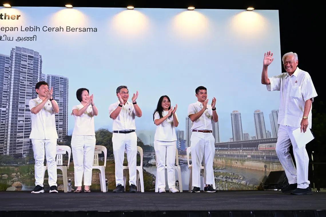 Defence Minister Ng Eng Hen at the PAP rally at Bishan Stadium on April 30. With him are (from left) anchor minister for Bishan-Toa Payoh GRC Chee Hong Tat, Marymount SMC incumbent MP Gan Siow Huang, and the other members of the Bishan-Toa Payoh GRC slate –Mr Saktiandi Supaat, Ms Elysa Chen and Mr Cai Yinzhou.