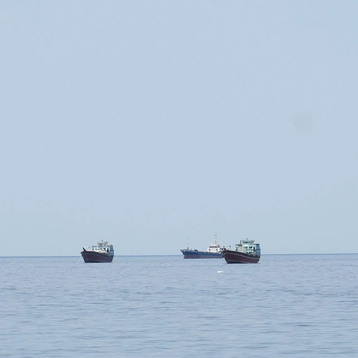 Ships and boats in the Strait of Hormuz, Musandam, Oman, April 24, 2026. REUTERS