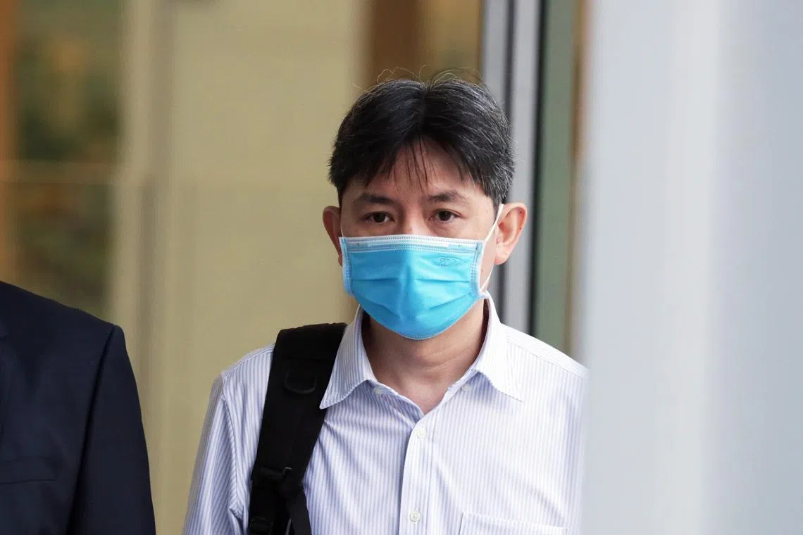 Former SMU associate director Christopher Tan Toh Nghee leaving the State Courts in March 2021. He pleaded guilty on July 1 to 16 charges.