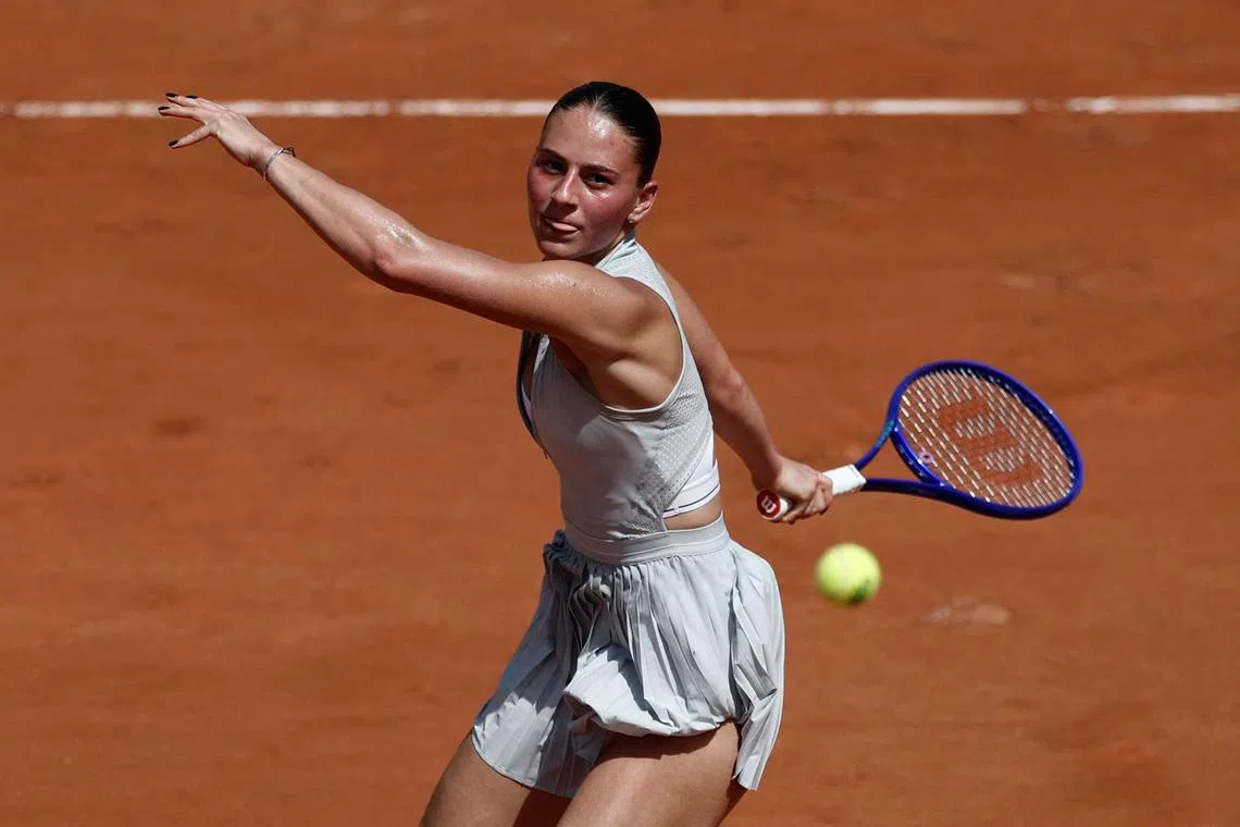 Ukraine's Marta Kostyuk in action during her first round match against Russia's Oksana Selekhmeteva.