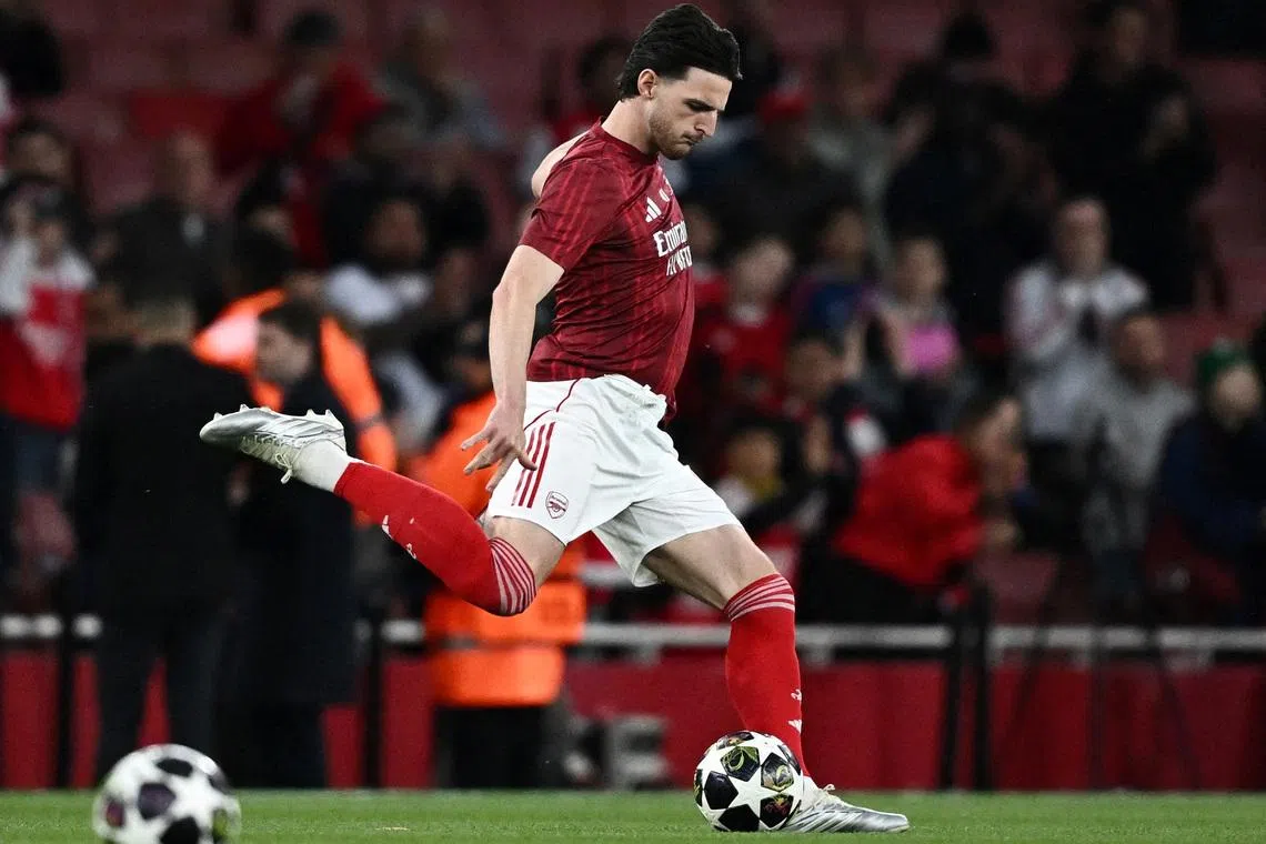 FILE PHOTO: Soccer Football - UEFA Champions League - Semi Final - Second Leg - Arsenal v Atletico Madrid - Emirates Stadium, London, Britain - May 5, 2026 Arsenal's Declan Rice during the warm up before the match REUTERS/Dylan Martinez/File Photo