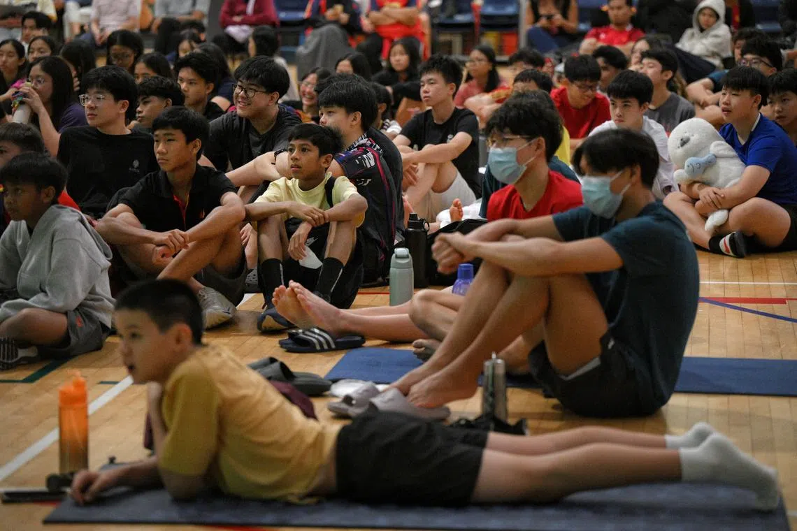 Students, parents and staff of Singapore Sports School (SSP) watch a screening of the World Cup Final at the SSP auditorium on July 20, 2026.