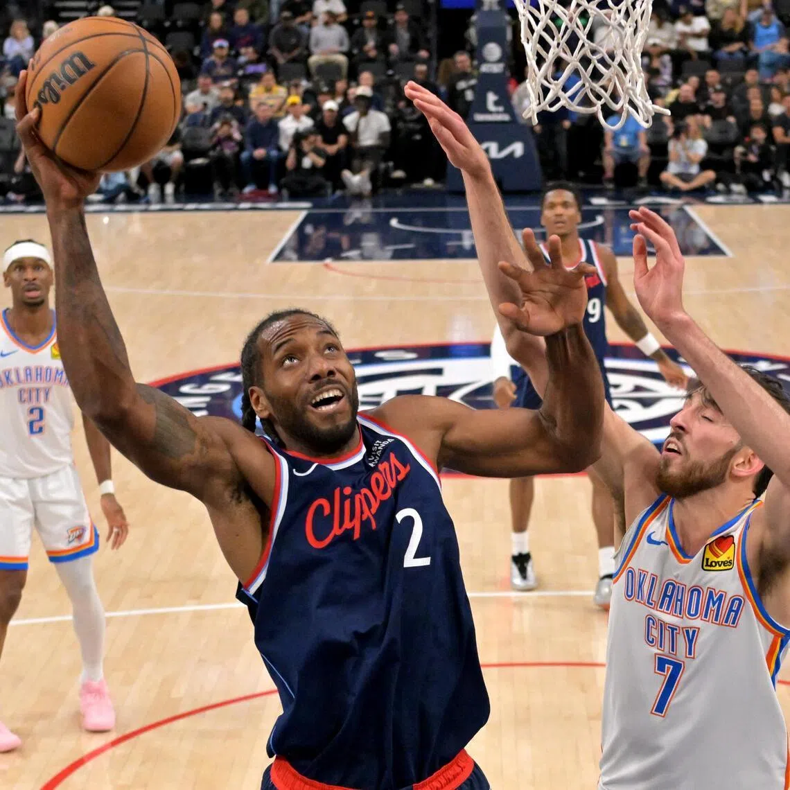 Oklahoma City Thunder center Chet Holmgren defends a shot by Los Angeles Clippers forward Kawhi Leonard in the first half at Intuit Dome.