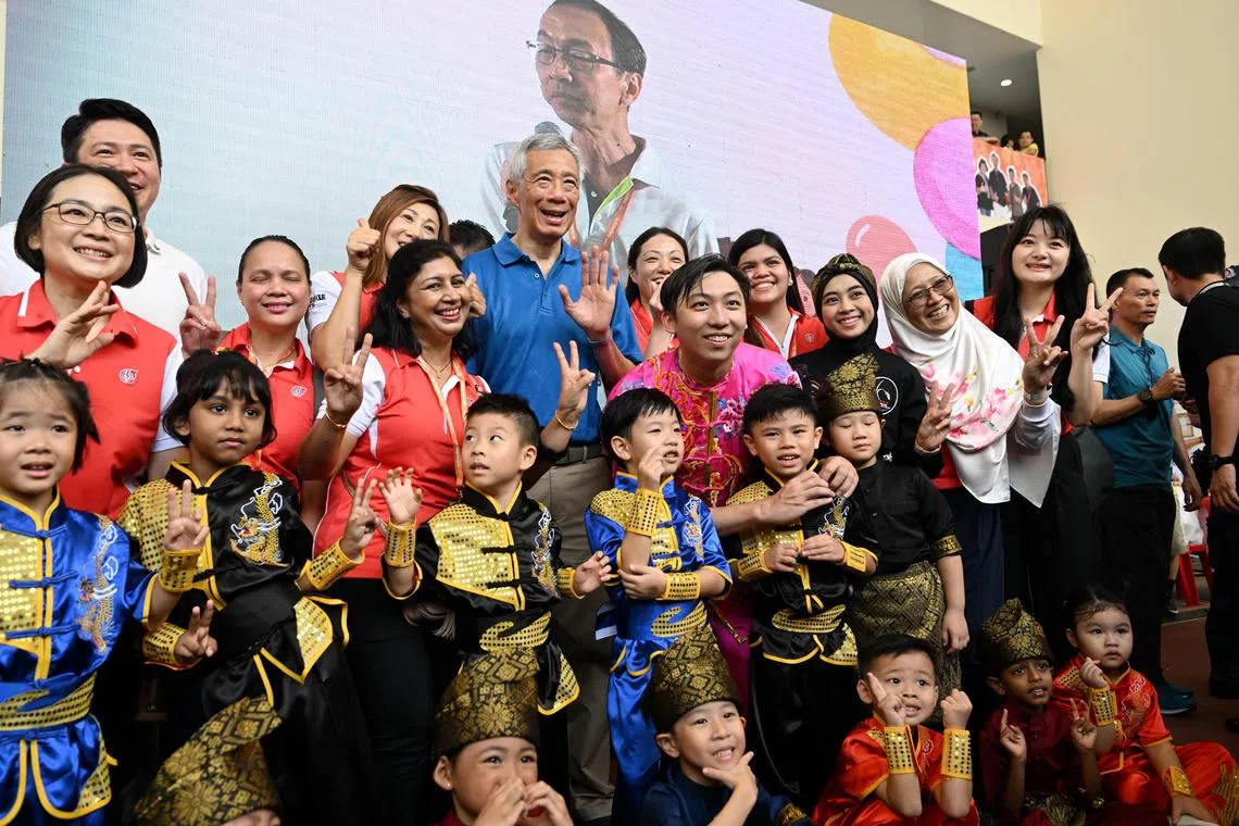 PM Lee Hsien Loong on a walkabout at Kebun Baru Family Day at Kebun Baru Community Club on April 15, 2023.