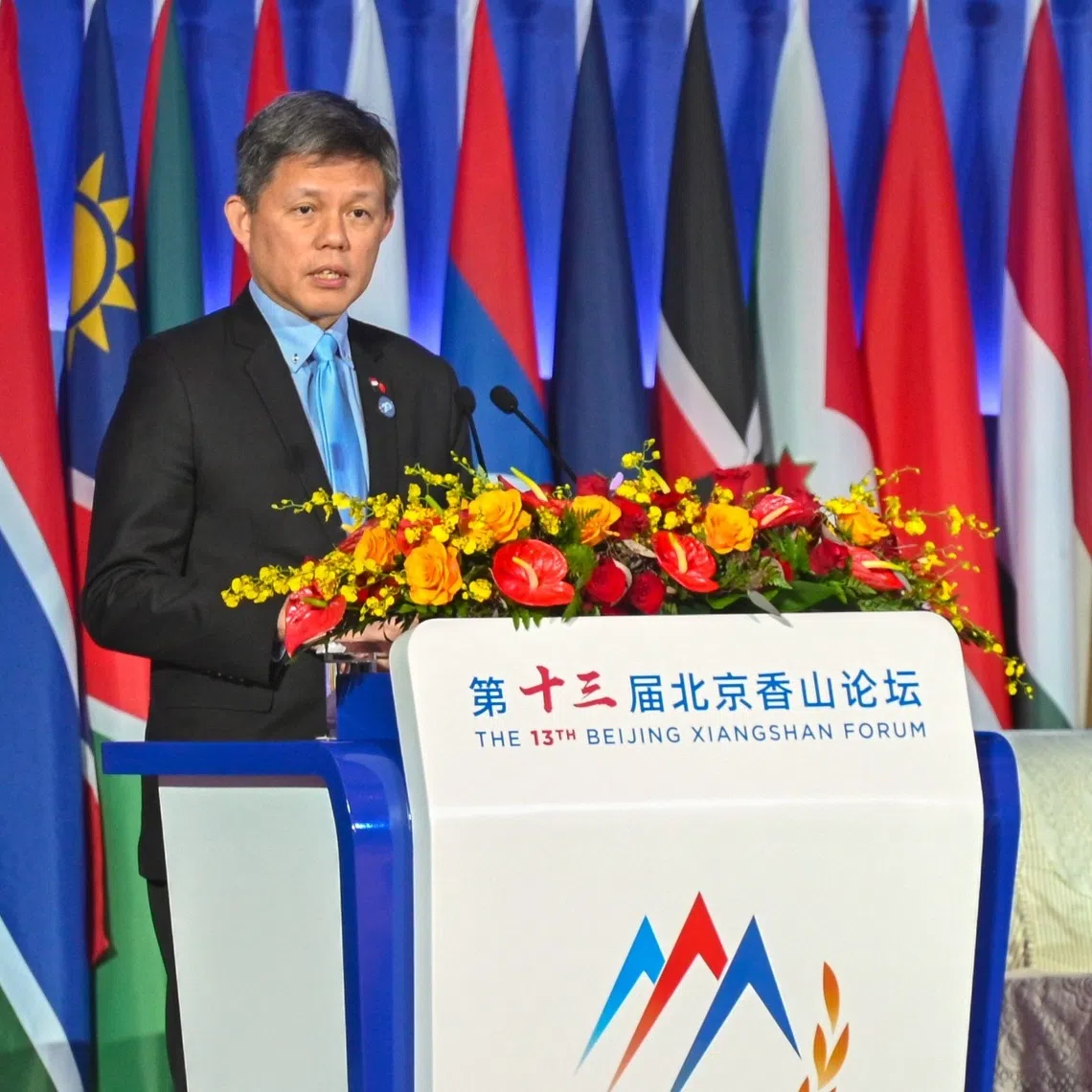 Defence Minister Chan Chun Sing delivering his speech at the 13th Beijing Xiangshan Forum on Sept 16.