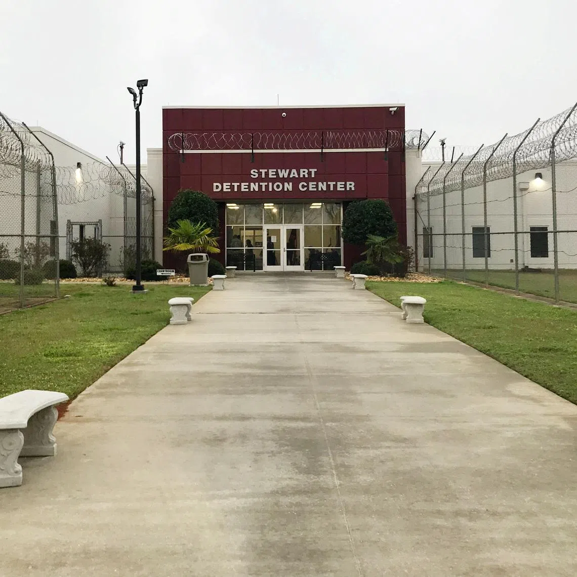 FILE PHOTO: The entrance to the Stewart Detention Center is pictured in Lumpkin, Georgia, U.S. February 21 , 2018.  Picture taken February 21, 2018. REUTERS/Reade Levinson/File Photo