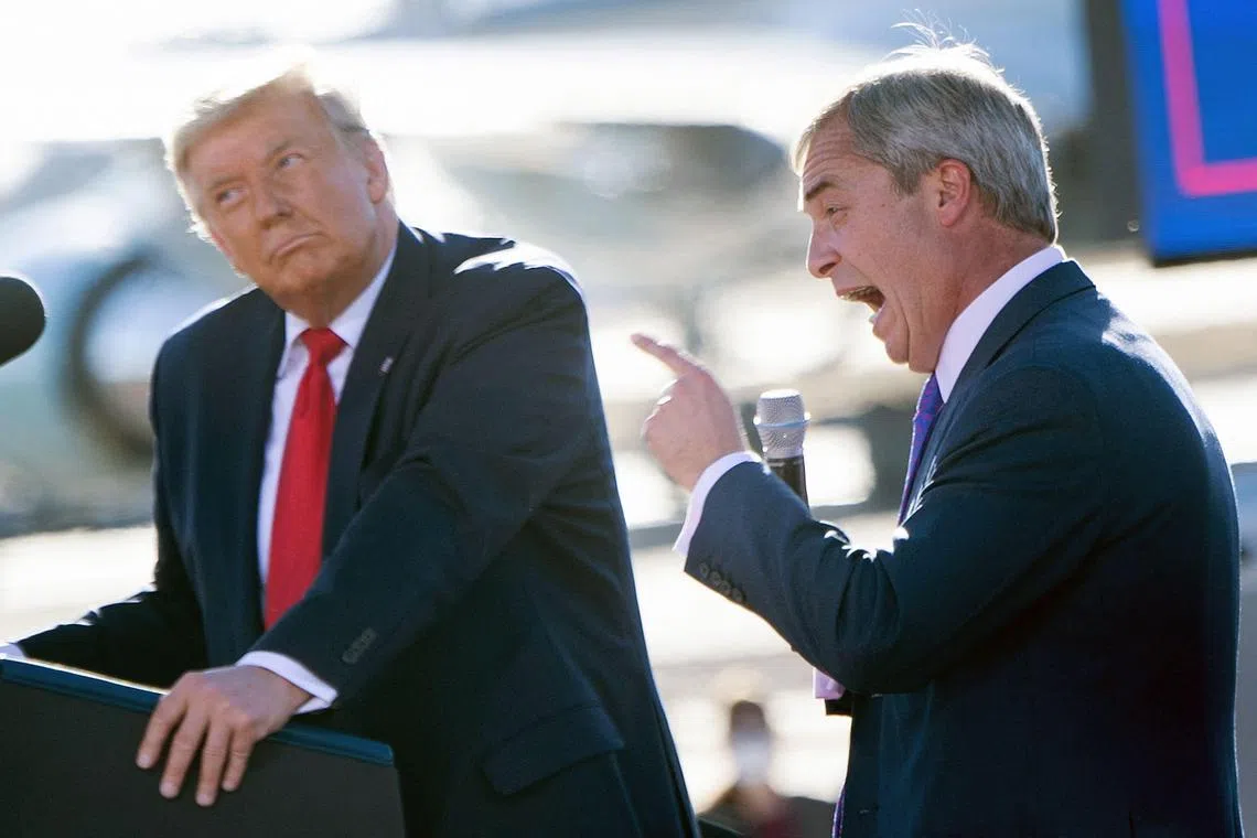 A 2020 photo shows then US president Donald Trump listening as Nigel Farage speaks at a Make America Great Again rally in Arizona. 