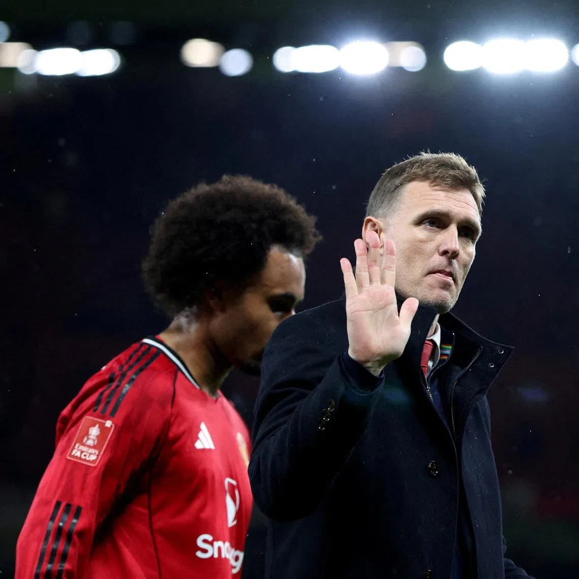 Soccer Football - FA Cup - Third Round - Manchester United v Brighton & Hove Albion - Old Trafford, Manchester, Britain - January 11, 2026 Manchester United interim manager Darren Fletcher reacts after the match REUTERS/Scott Heppell