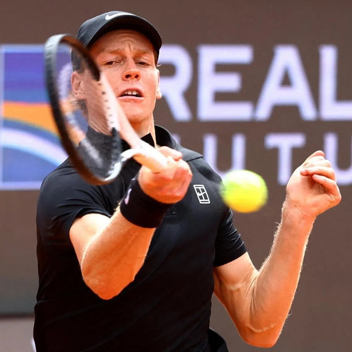Italy's Jannik Sinner in action during his quarter final match against Russia's Andrey Rublev.