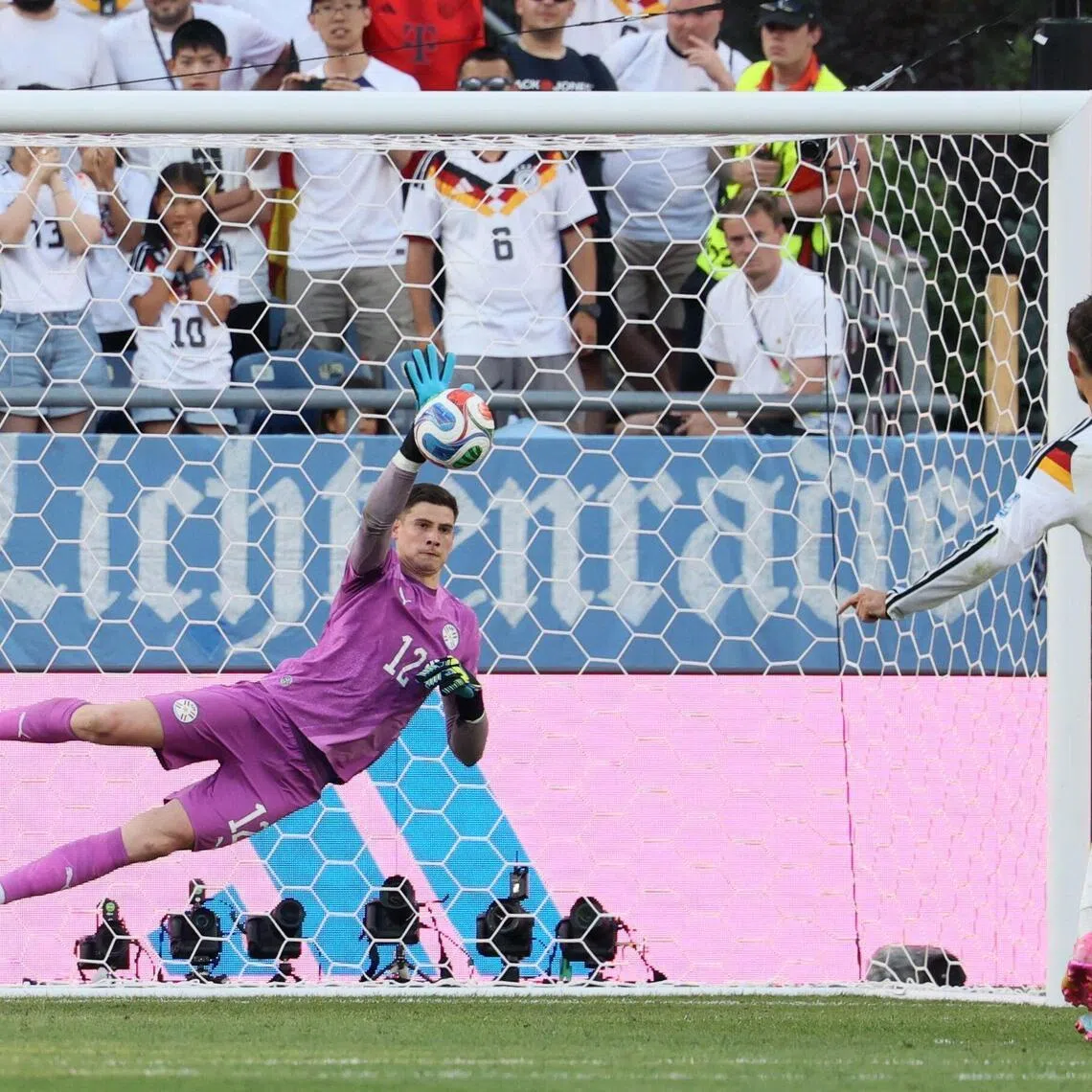 Paraguay’s goalkeeper Orlando Gill saves the penalty kick by Germany’s forward Kai Havertz during the penalty shoot-out of the 2026 World Cup match between Germany and Paraguay on June 29.
