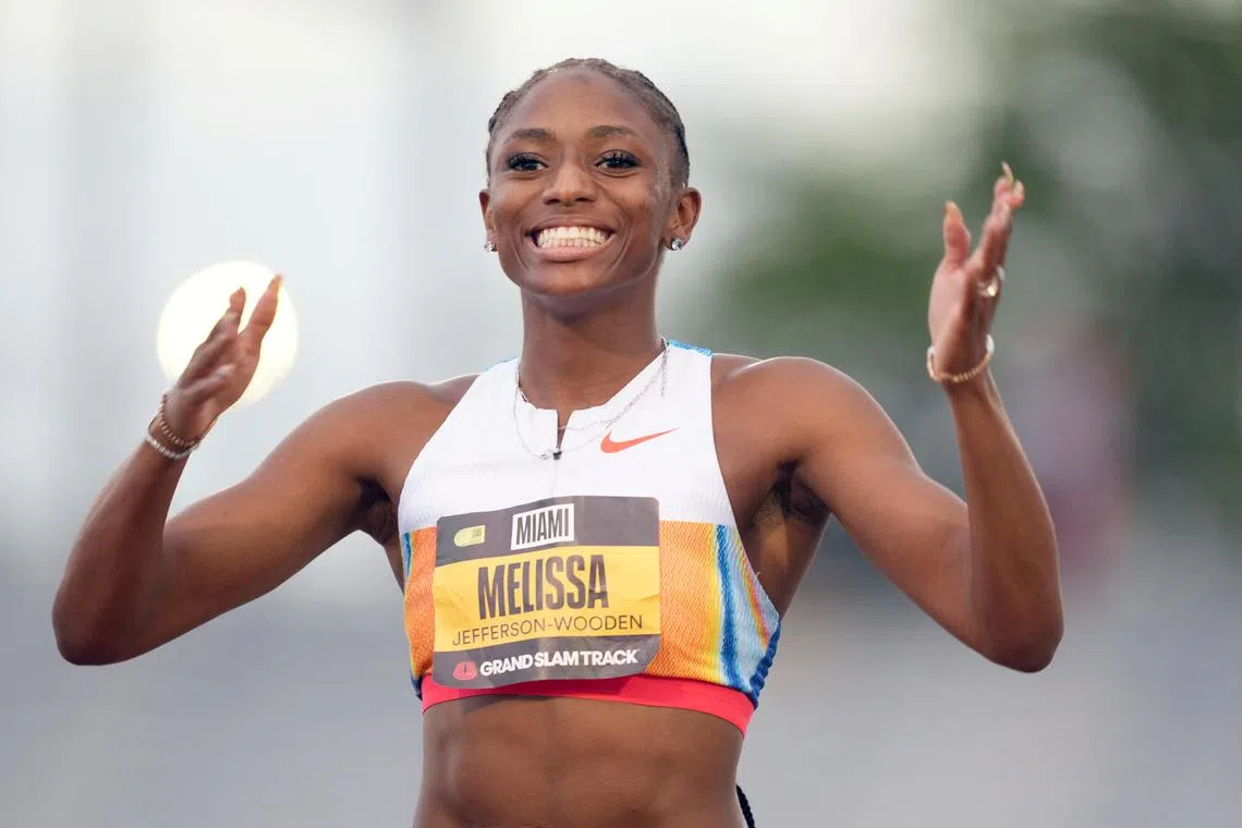 American Melissa Jefferson-Wooden is delighted after winning the women's short sprints title in the Grand Slam Track Miami at Ansin Sports Complex.