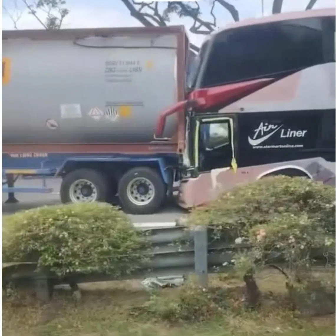 A video uploaded on Facebook shows the vehicles  -  two trailers, a bus and a lorry - on one side of the route.