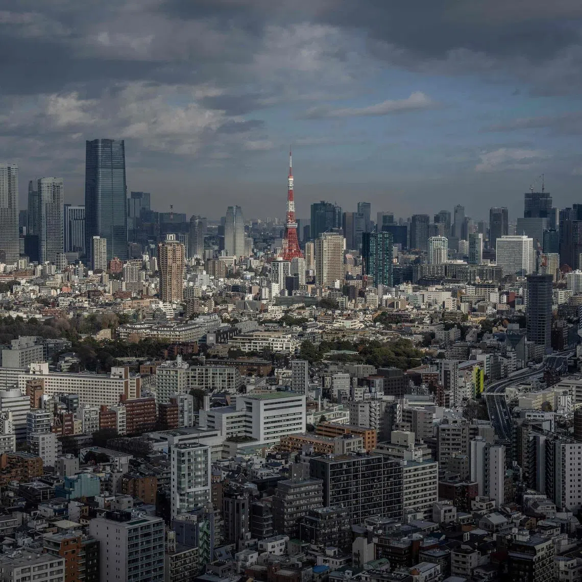 The men allegedly stole three suitcases containing the cash in Tokyo’s Ueno district in a robbery in January.