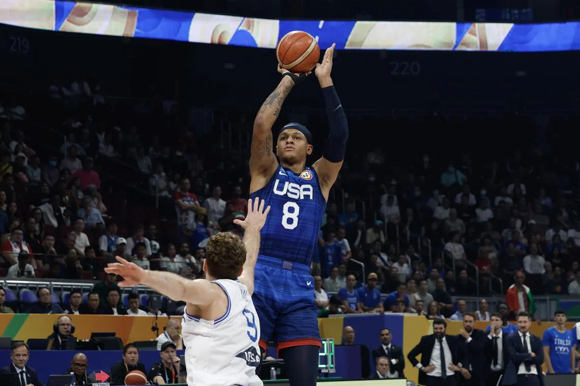 Paolo Banchero of the USA (R) in action against Nicolo Melli of Italy (L) during the FIBA Basketball World Cup 2023 quarter final match between Italy and the USA in Manila, Philippines, 05 September 2023.  EPA-EFE/ROLEX DELA PENA