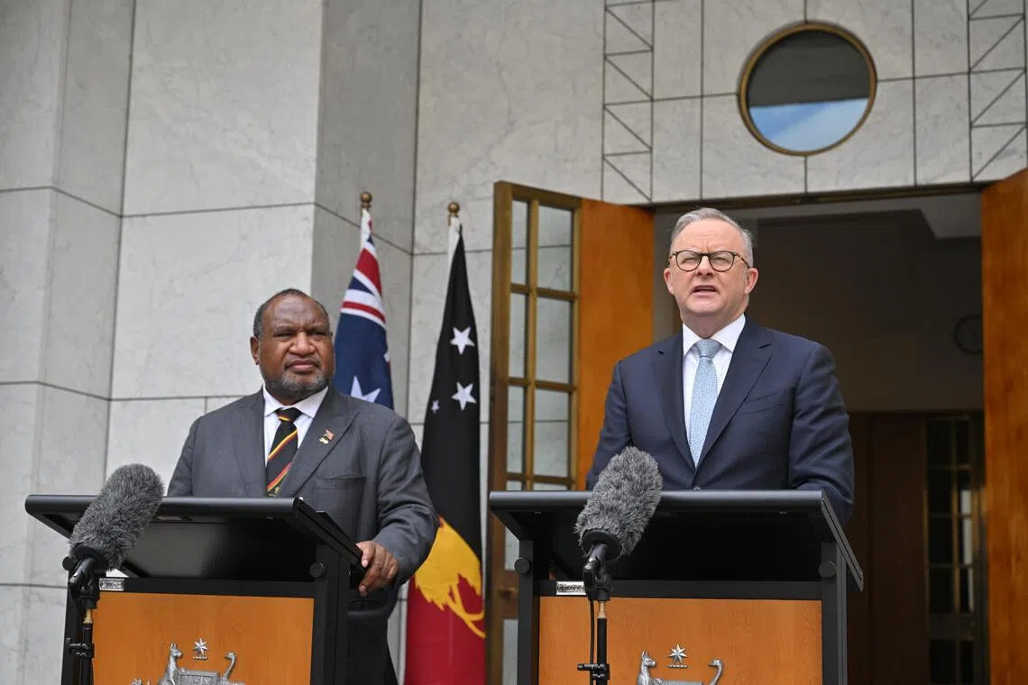 Australia's Prime Minister Anthony Albanese (right) and Papua New Guinea's Prime Minister James Marape (left) speak after signing a defence treaty at Parliament House in Canberra, Australia.