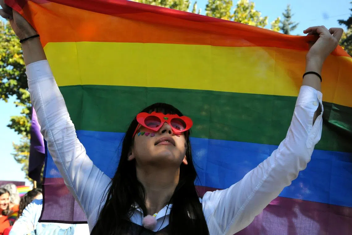 A woman takes part in the second lesbian, gay, bisexual and transgender (LGBT) Pride Parade in Pristina, Kosovo October 10, 2018. REUTERS/Laura Hasani/ File Photo
