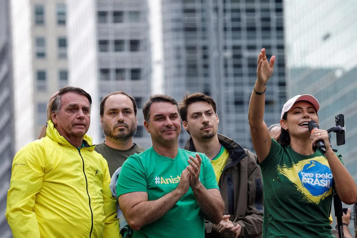 Former Brazilian President Jair Bolsonaro and his wife Michelle Bolsonaro attend a demonstration against Jair Bolsonaro's judicial process and to demand the amnesty of all accused of taking part in allegedly conspiring to overthrow the government, in Sao Paulo, Brazil, April 6, 2025. REUTERS/Amanda Perobelli